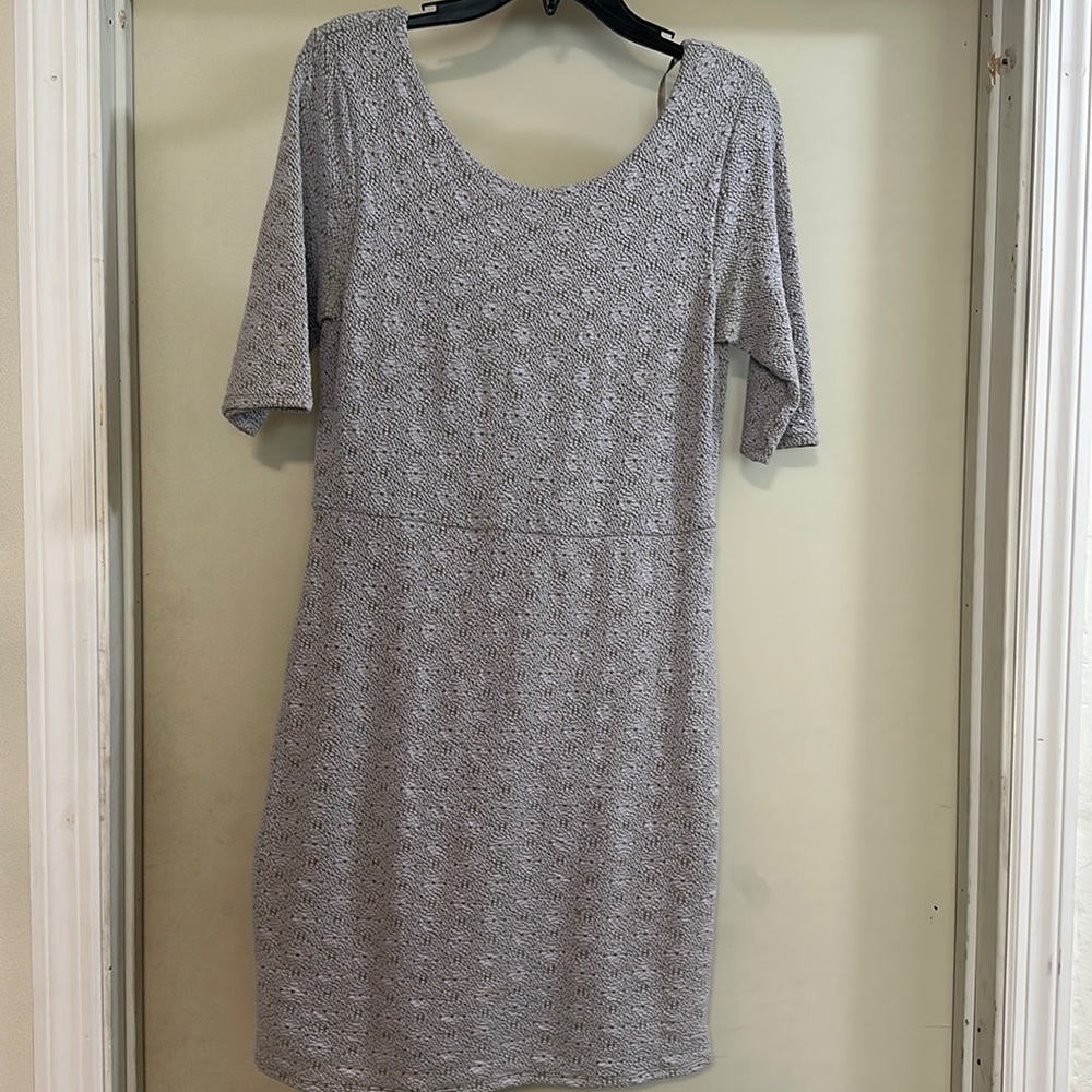 Free People body con dress in grayish blue with liner. Size L.